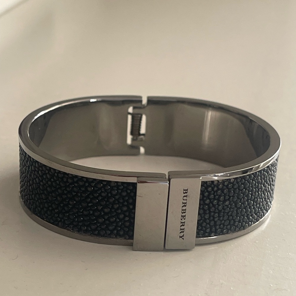 Never work ladies Burberry Bangle 
Gun metal grey and black